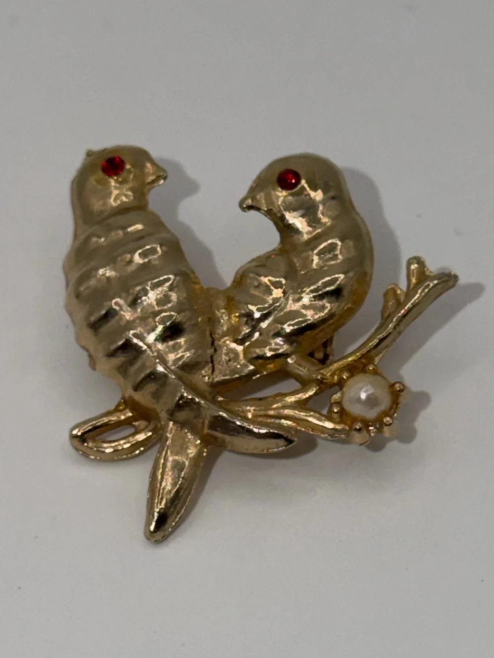 Gold-Tone Two Birds Brooch with Red Eyes and Pearl Accent